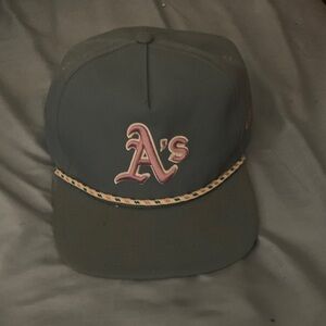 Baby Blue Baseball cap with light pink logo and